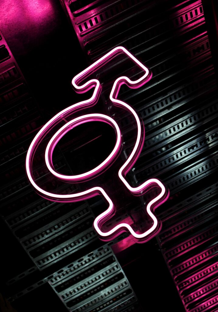 Neon gender symbols - a combination of Mars (male) and Venus (female)